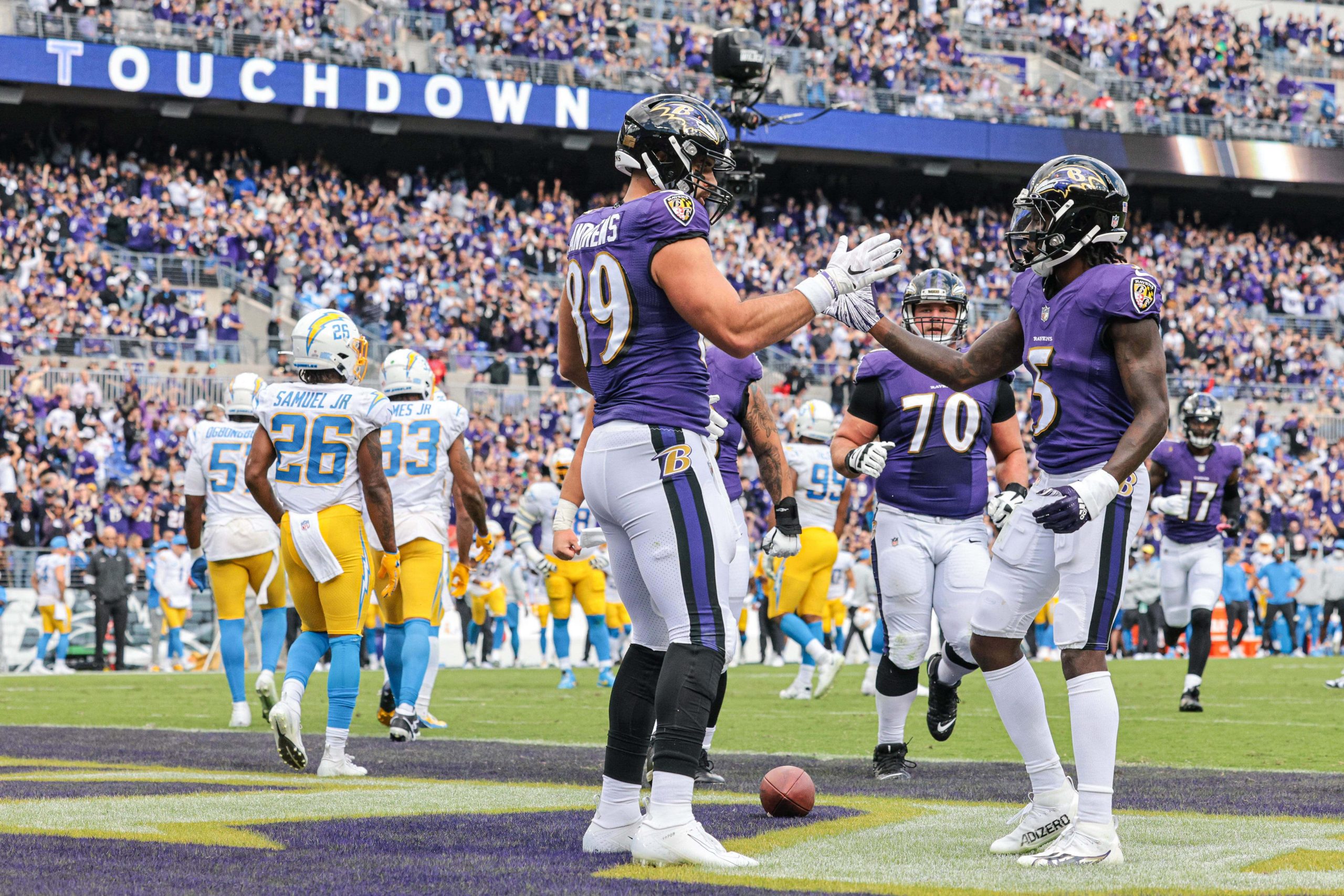 Baltimore Ravens tight end Mark Andrews (89) celebrates his touchdown reception with wide receiver Marquise Brown