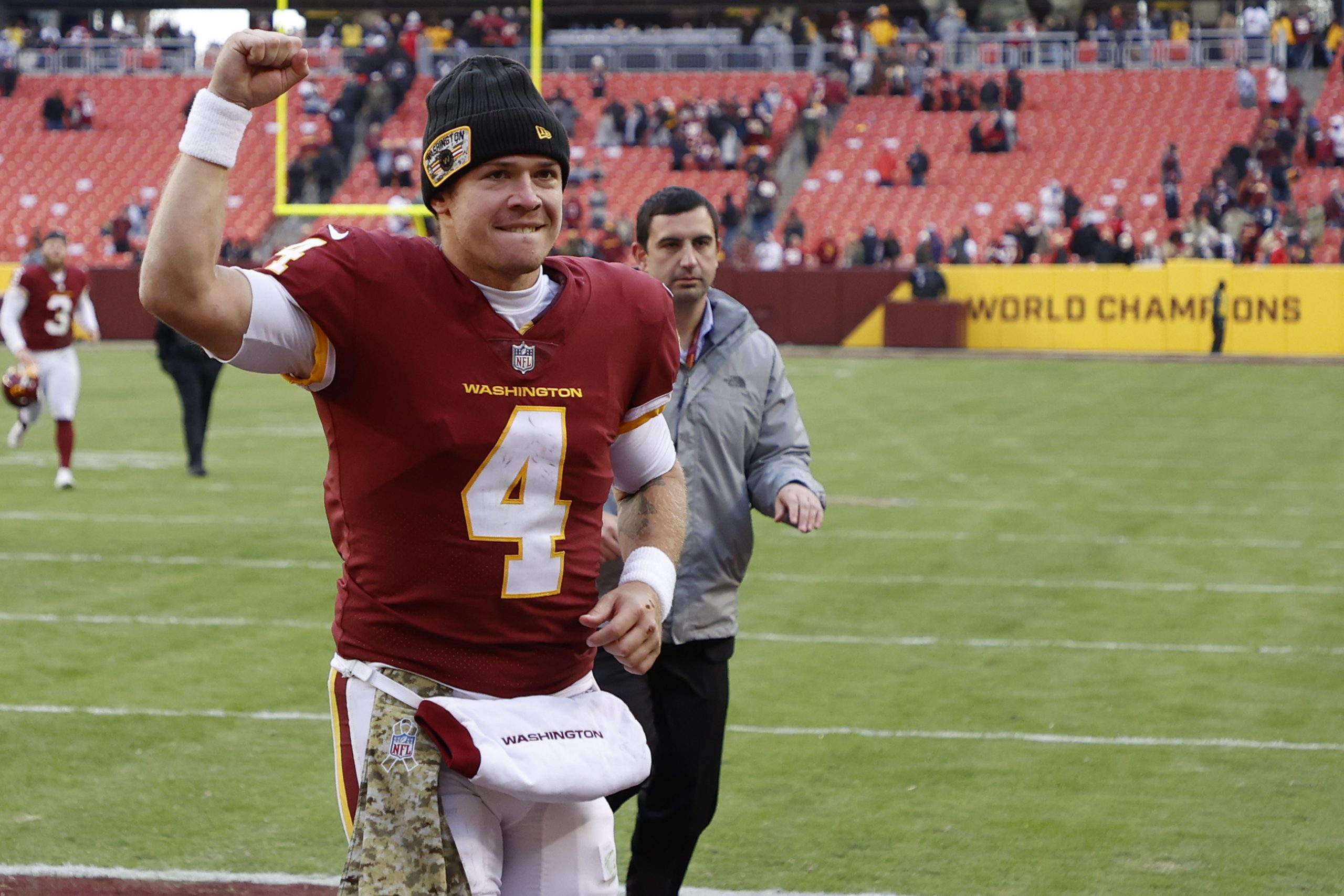 Washington Football Team quarterback Taylor Heinicke (4) celebrates while leaving the field after the game against the Tampa Bay Buccaneers at FedExField parlay