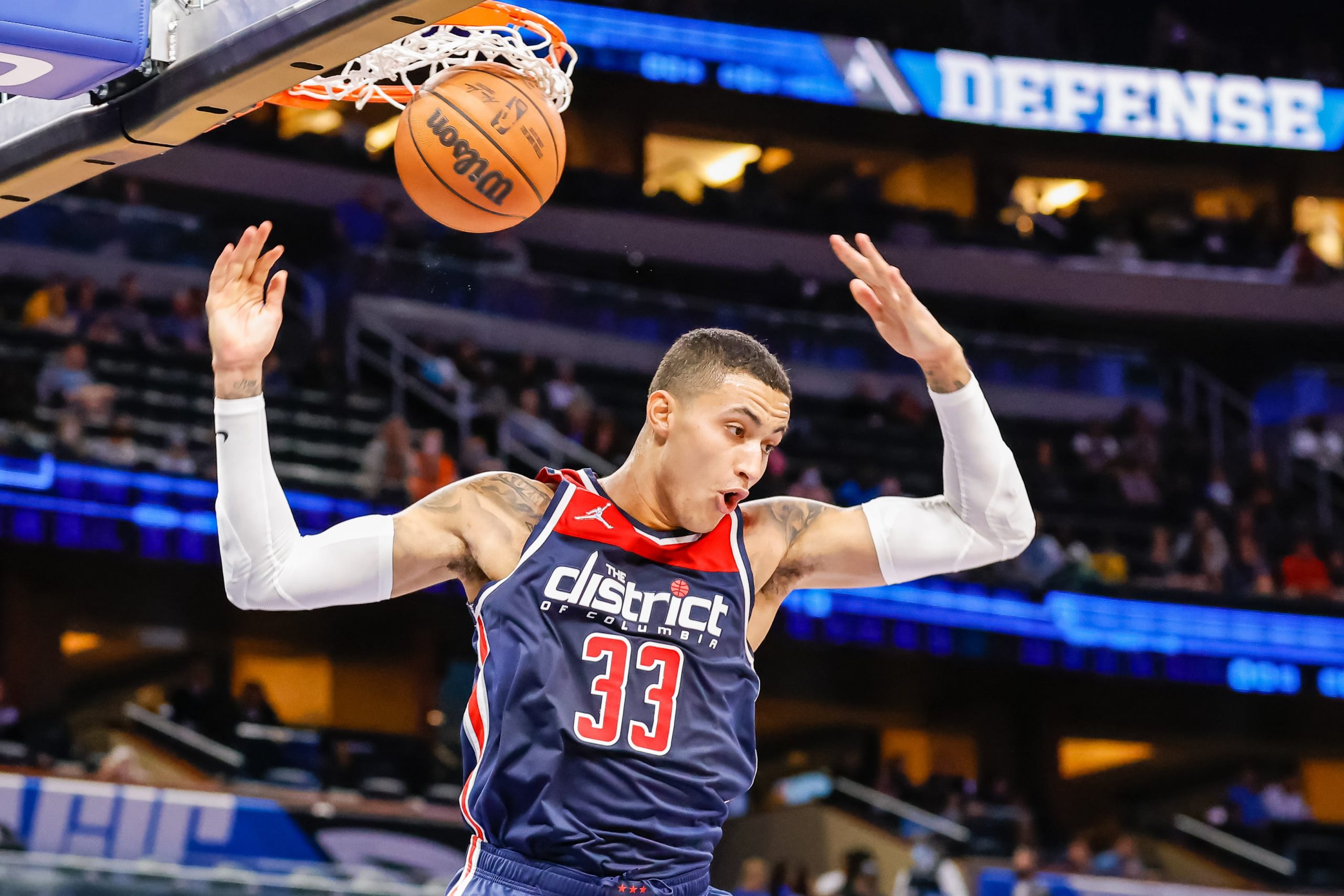 Washington Wizards forward Kyle Kuzma (33) dunks the ball against the Orlando Magic during the first quarter at Amway Center.