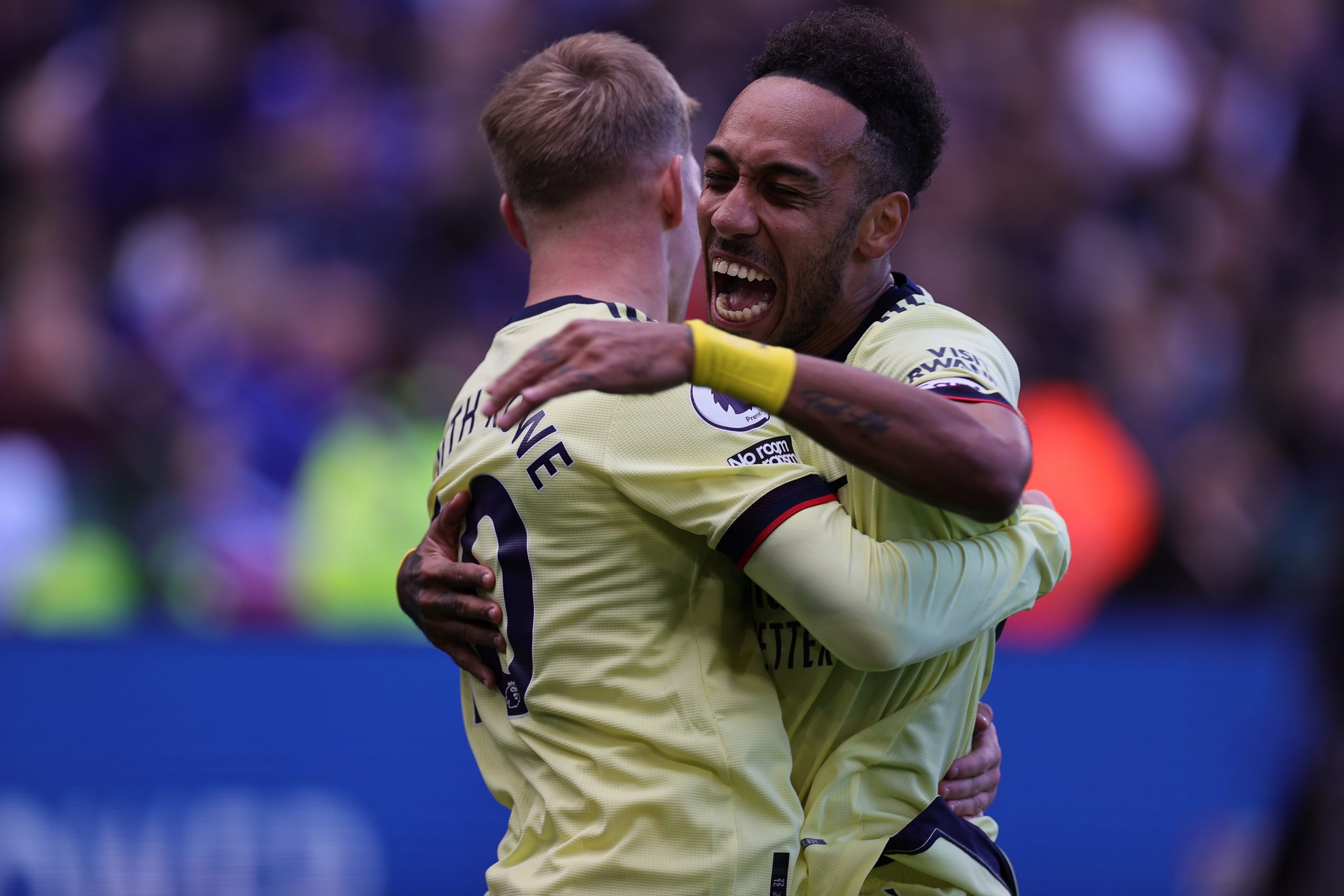 Emile Smith Rowe of Arsenal celebrates with Pierre-Emerick Aubameyang of Arsenal after scoring their sides second goal of the match to make it 2-0 during the Premier League match between Leicester City and Arsenal at The King Power Stadium on October 30, 2021 in Leicester, England.