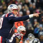 New England Patriots quarterback Mac Jones (10) on the line of scrimmage against the Tennessee Titans in the second half at Gillette Stadium.