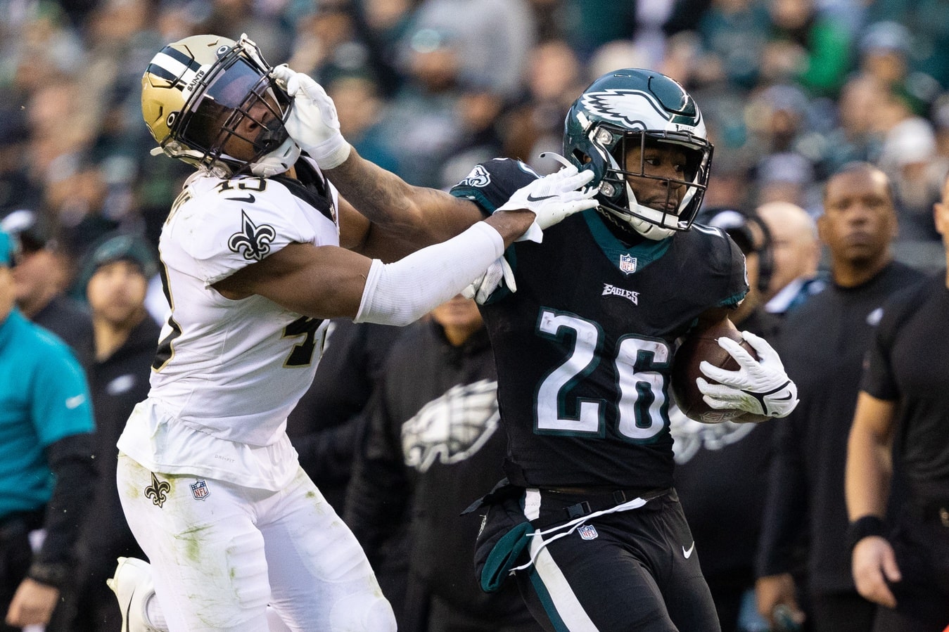 Philadelphia Eagles running back Miles Sanders (26) runs with the ball against New Orleans Saints free safety Marcus Williams (43) during the fourth quarter at Lincoln Financial Field.