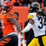 Cincinnati Bengals running back Joe Mixon (28) carries the ball as Pittsburgh Steelers safety Terrell Edmunds (34) defends in the third quarter during a Week 12 NFL football game, Sunday.