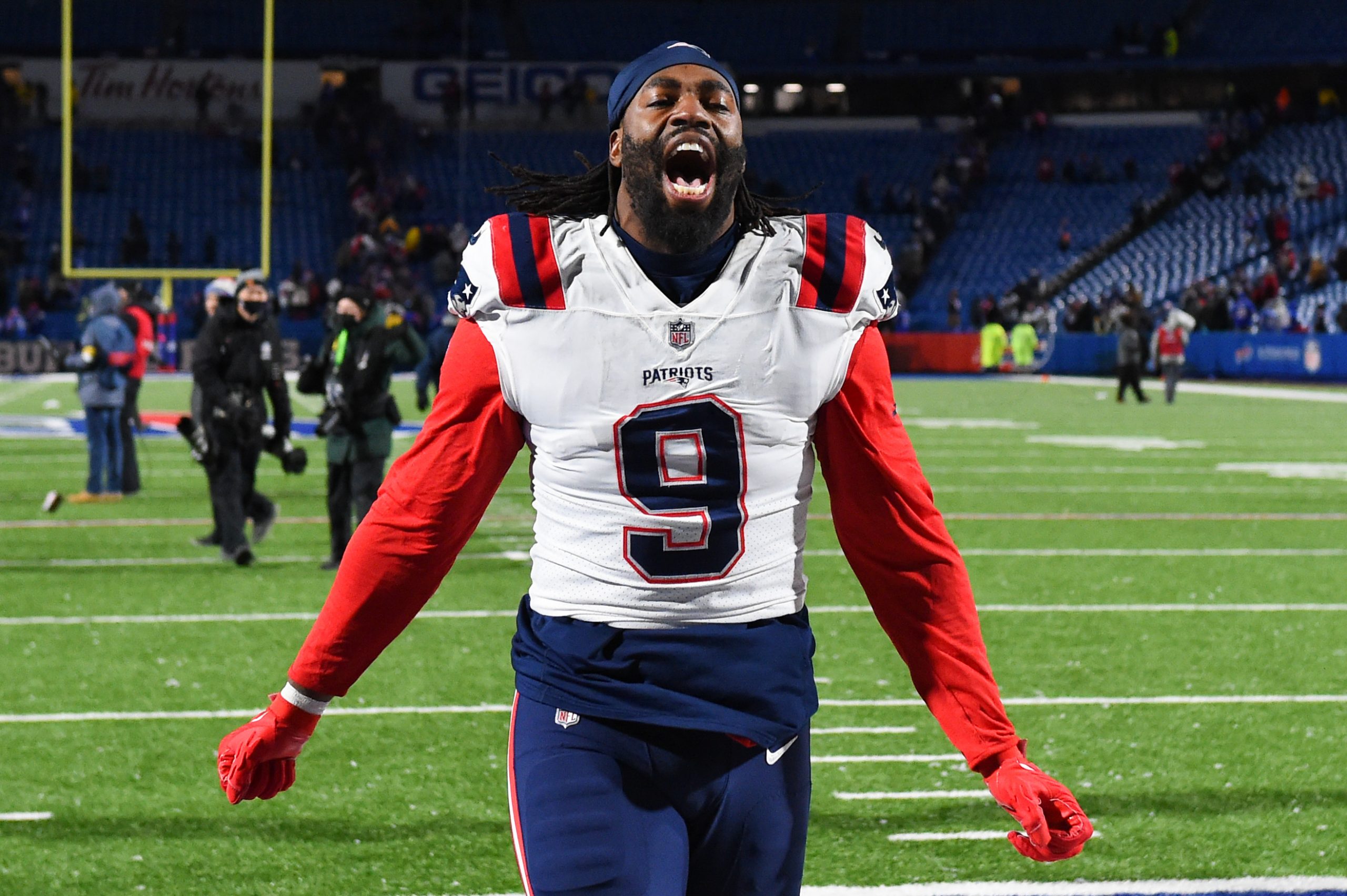 New England Patriots outside linebacker Matt Judon (9) celebrates while leaving the field following the game against the Buffalo Bills at Highmark Stadium