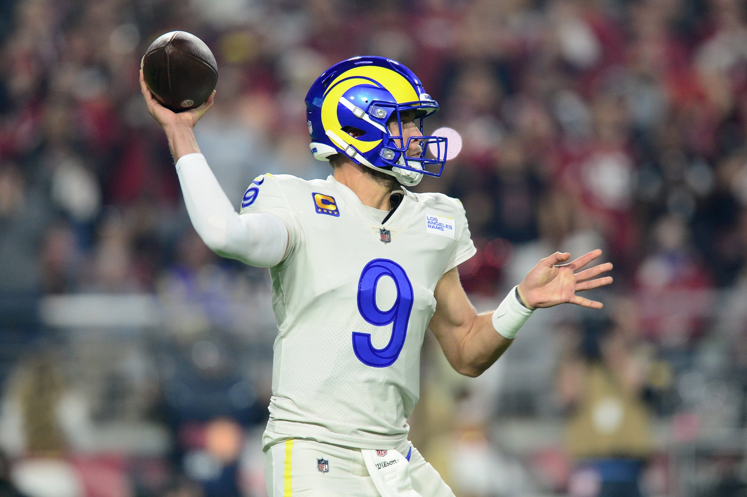 Los Angeles Rams quarterback Matthew Stafford (9) throws a pass against the Arizona Cardinals during the first half at State Farm Stadium