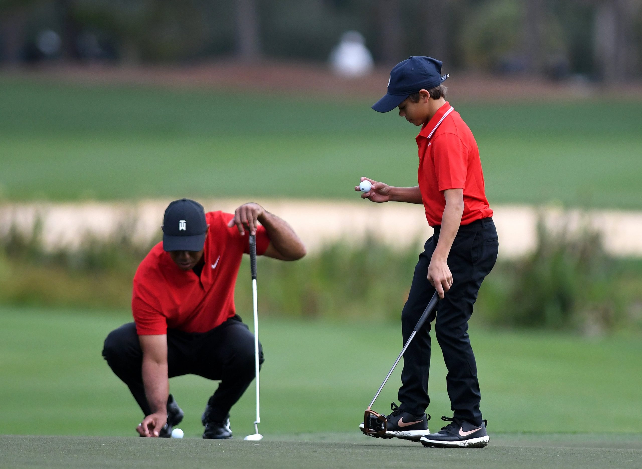 Tiger Woods and Charlie Woods