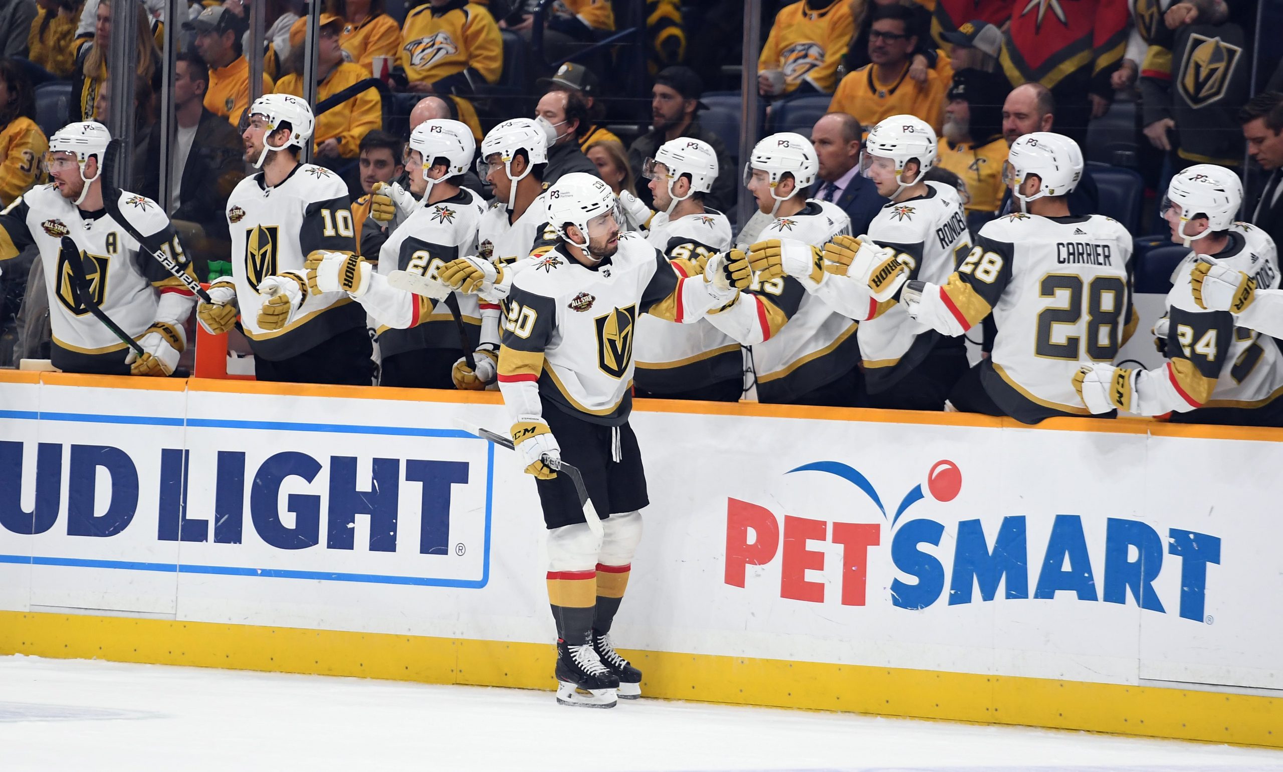 Vegas Golden Knights center Chandler Stephenson (20) celebrates with teammates after a goal during the first period against the Nashville Predators at Bridgestone Arena. Mandatory Credit: Christopher Hanewinckel-USA TODAY Sports
