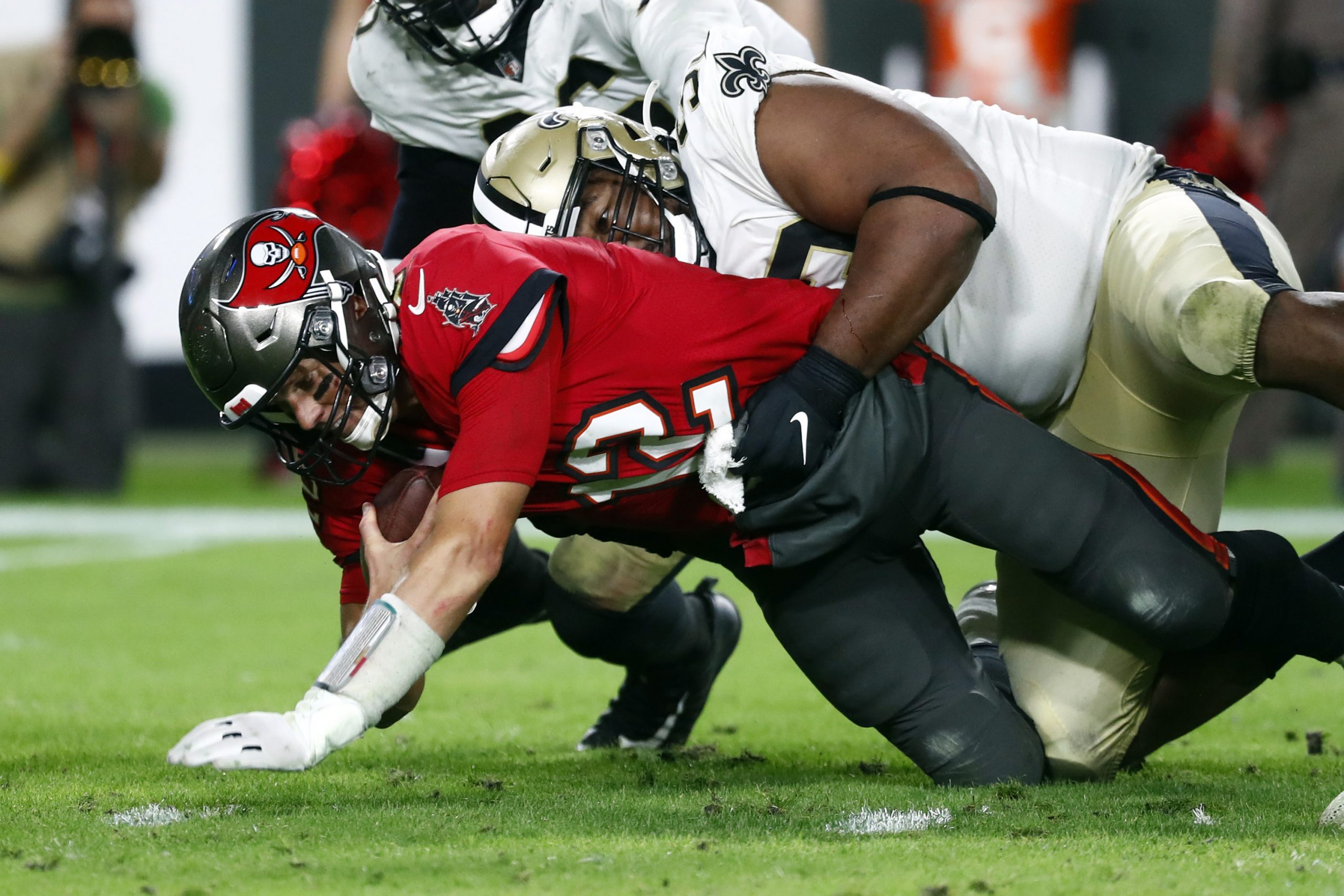 New Orleans Saints defensive tackle David Onyemata (93) sacks Tampa Bay Buccaneers quarterback Tom Brady (12) during the second half at Raymond James Stadium