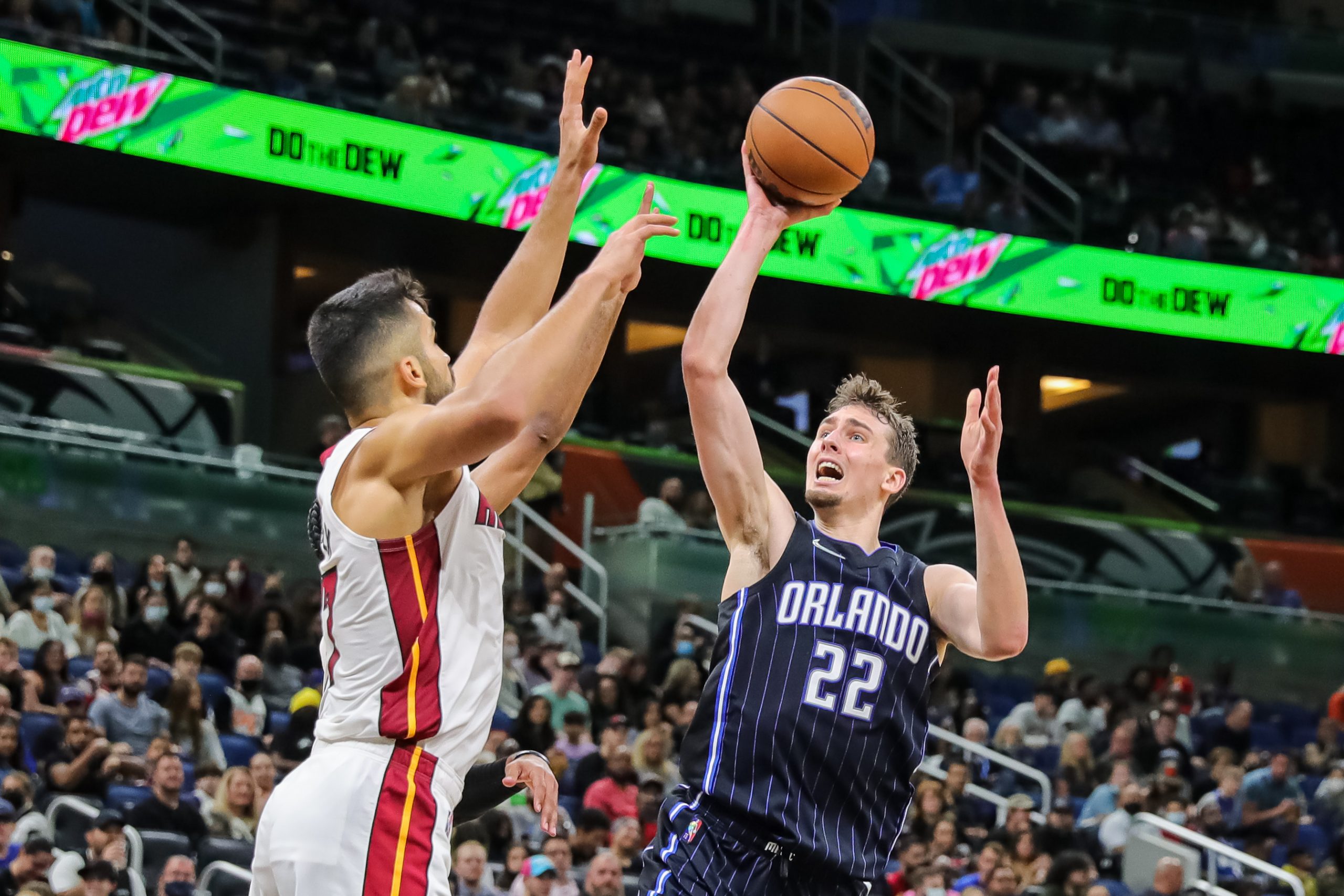 Orlando Magic forward Franz Wagner (22) shoots the ball against Miami Heat center Omer Yurtseven (77) during the second half at Amway Center