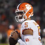 Clemson quarterback D.J. Uiagalelei (5) warms up before an NCAA college football game against South Carolina Saturday, Nov. 27, 2021, in Columbia, S.C. Clemson won 30-0