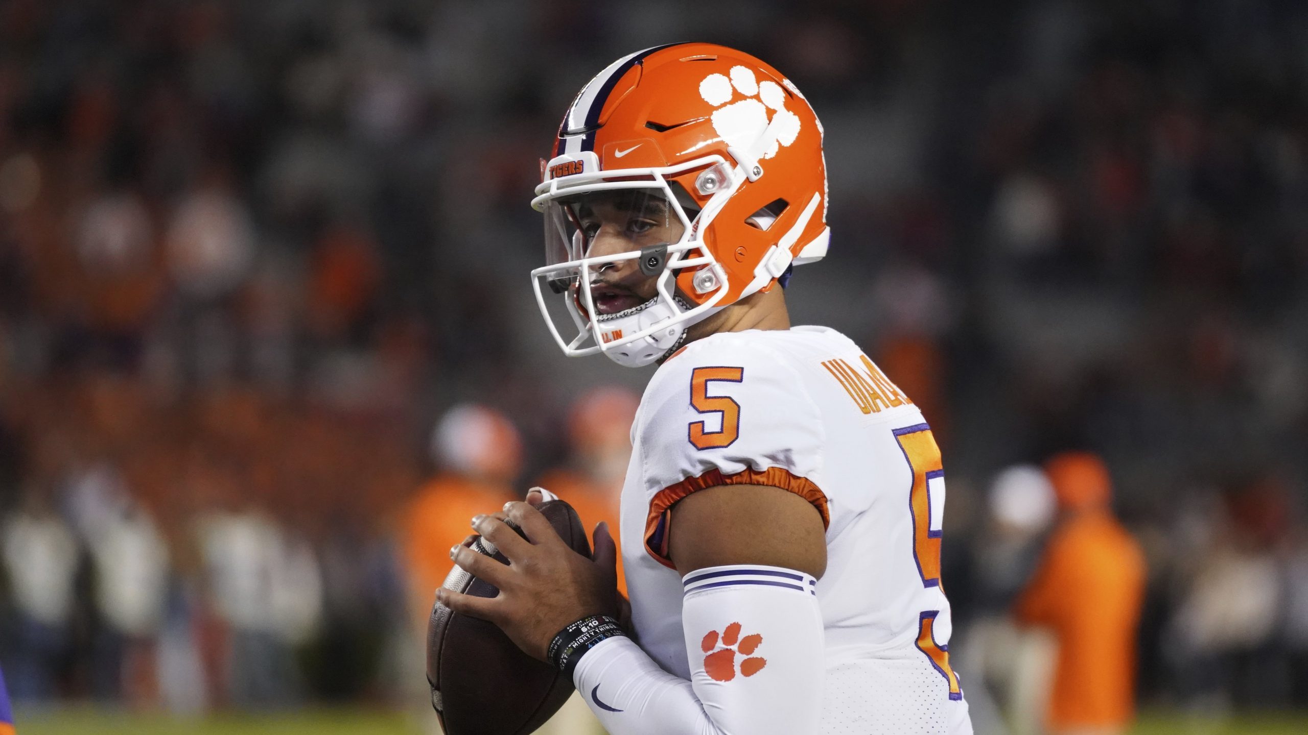 Clemson quarterback D.J. Uiagalelei (5) warms up before an NCAA college football game against South Carolina Saturday, Nov. 27, 2021, in Columbia, S.C. Clemson won 30-0