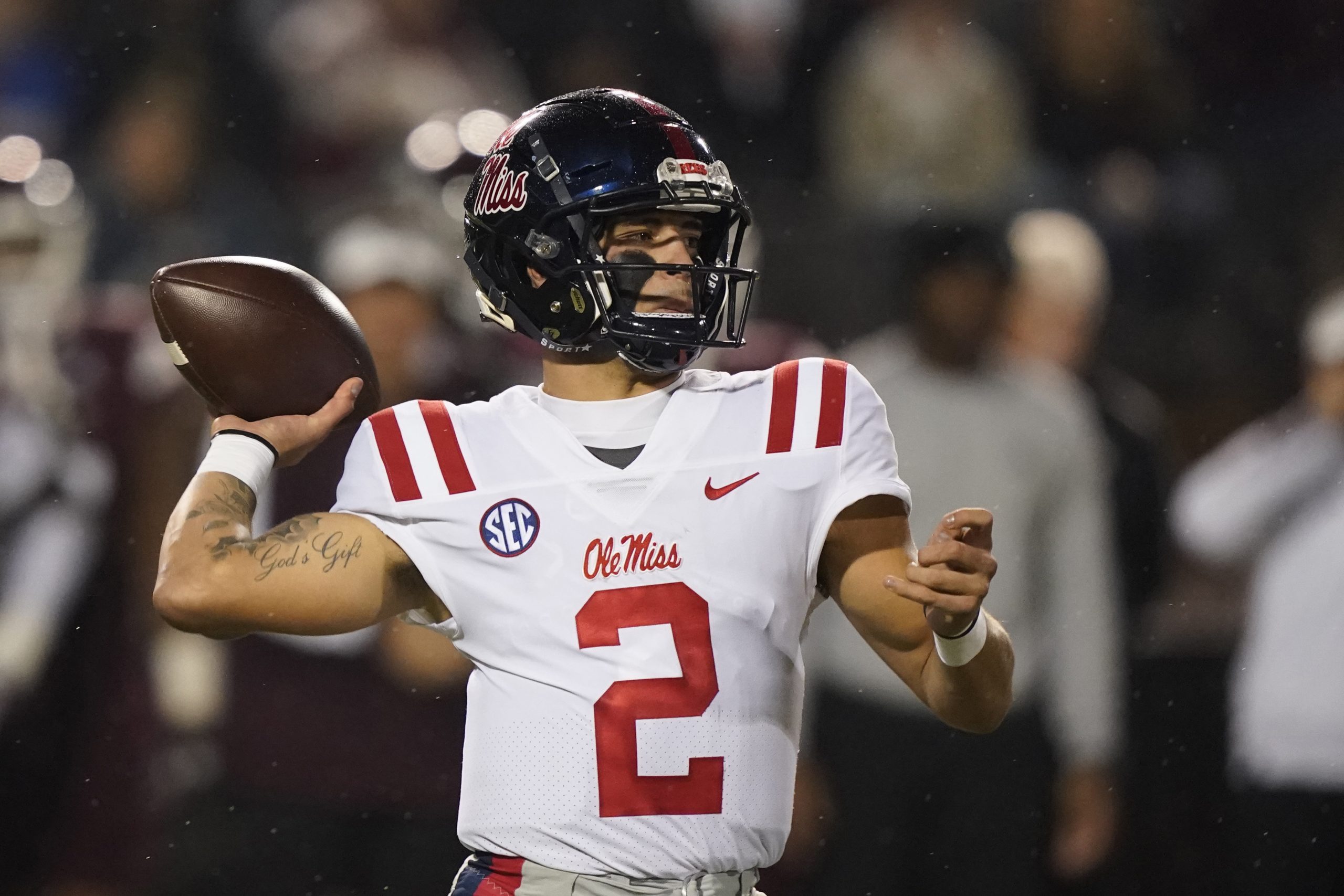Mississippi quarterback Matt Corral (2) passes against Mississippi State during the first half of an NCAA college football game, Thursday, Nov. 25, 2021, in Starkville, Miss. The Southeastern Conference's most prolific offense clashes with one of the better defenses in the Big 12 when No. 8 Mississippi meets sixth-ranked Baylor in the Sugar Bowl