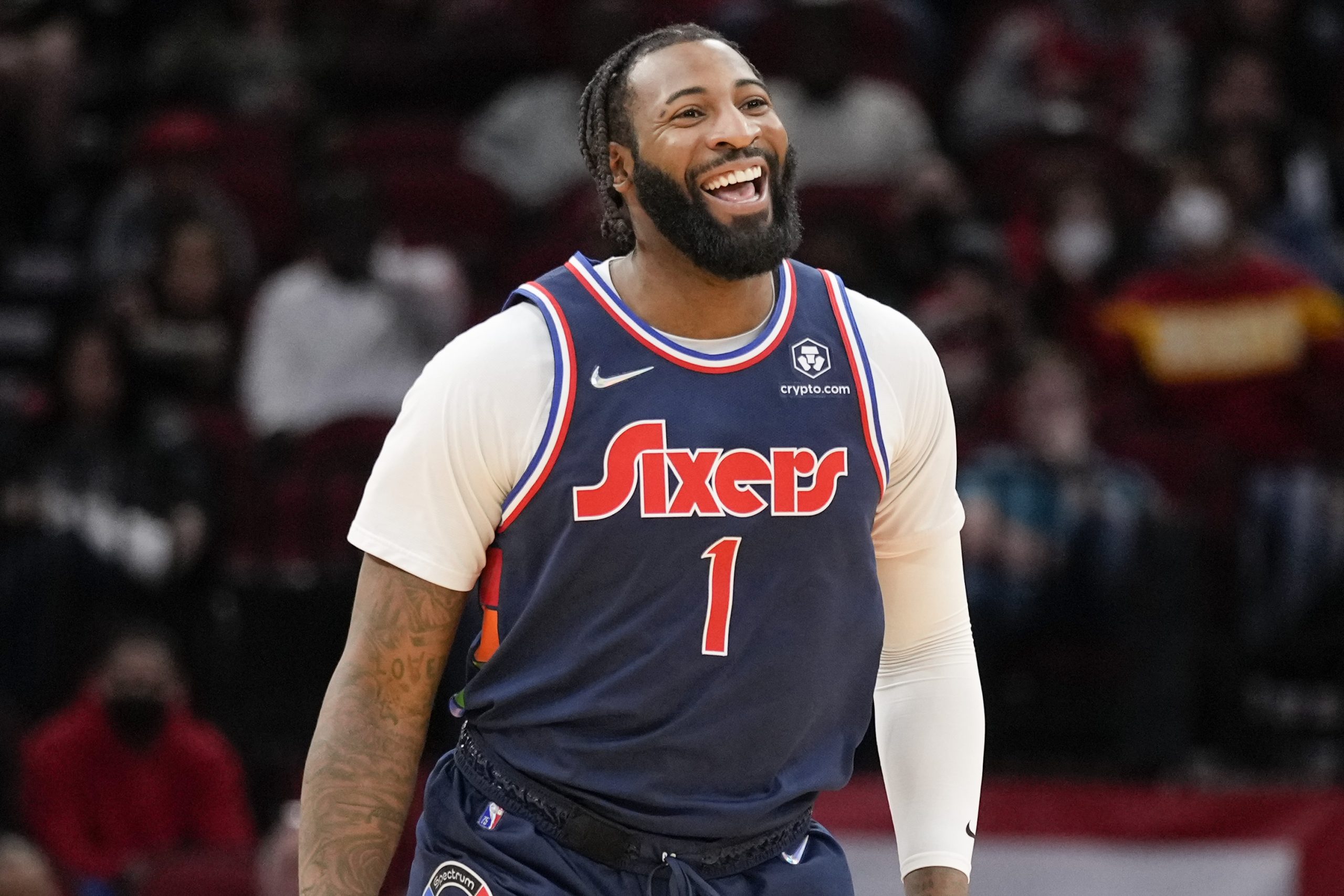 Philadelphia 76ers center Andre Drummond reacts after his dunk during the first half of an NBA basketball game against the Houston Rockets, Monday, Jan. 10, 2022, in Houston.