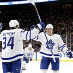 Auston Matthews (34) and Toronto Maple Leafs center Jason Spezza (19)