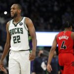Milwaukee Bucks' Khris Middleton reacts to a call during the second half of an NBA basketball game against the Toronto Raptors Wednesday, Jan. 5, 2022, in Milwaukee.