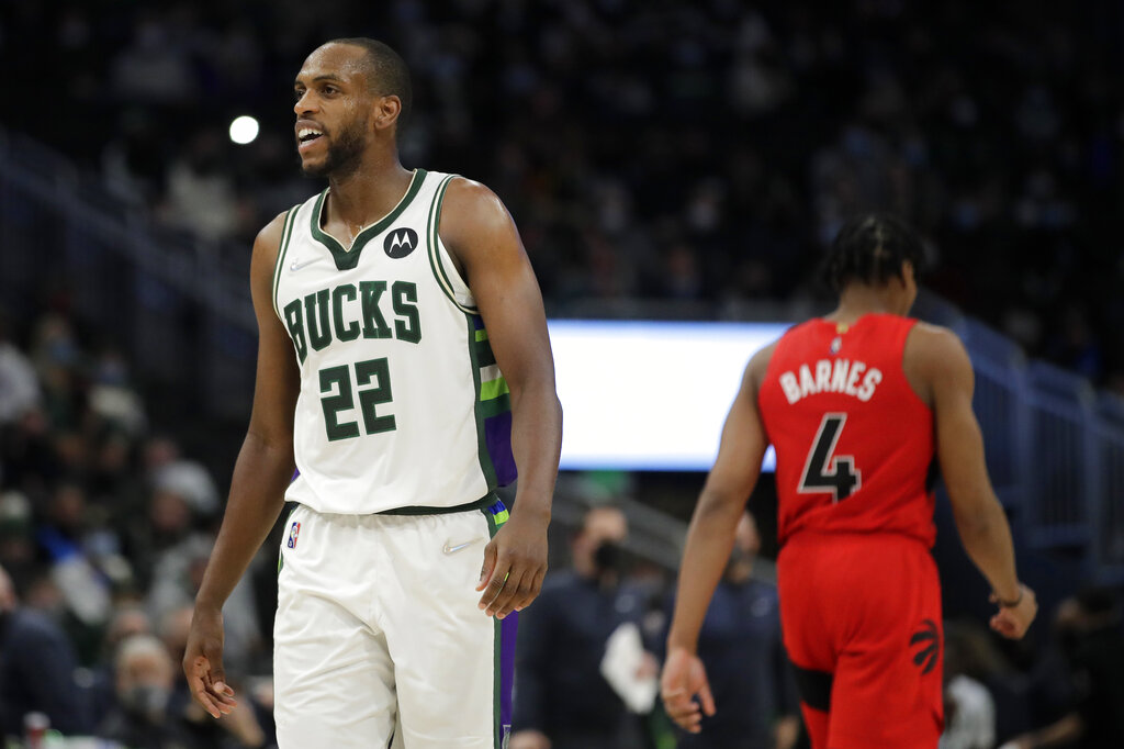 Milwaukee Bucks' Khris Middleton reacts to a call during the second half of an NBA basketball game against the Toronto Raptors Wednesday, Jan. 5, 2022, in Milwaukee.
