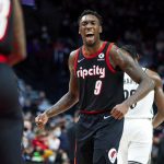Portland Trail Blazers forward Nassir Little rects after scoring a basket against the Brooklyn Nets during the second half of an NBA basketball game in Portland, Ore., Monday, Jan. 10, 2022.