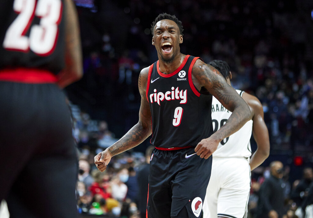 Portland Trail Blazers forward Nassir Little rects after scoring a basket against the Brooklyn Nets during the second half of an NBA basketball game in Portland, Ore., Monday, Jan. 10, 2022.