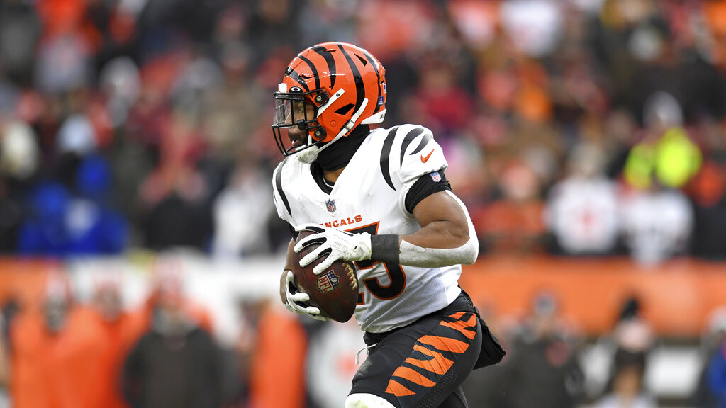 Cincinnati Bengals running back Chris Evans (25) carries the ball in the second half of an NFL football game, Sunday, Jan. 9, 2022, in Cleveland.