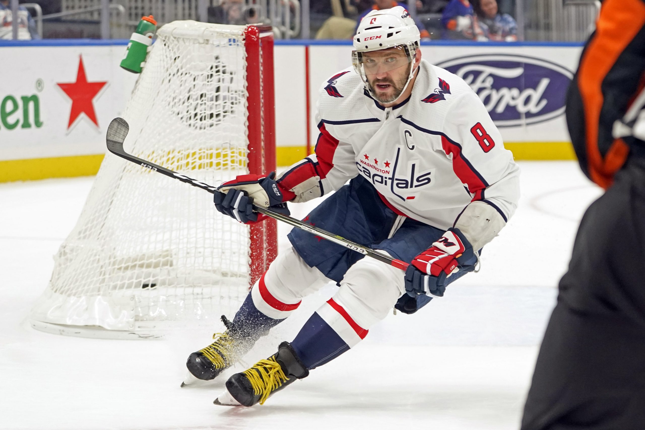 Washington Capitals left wing Alex Ovechkin scores on an empty net during the third period of an NHL hockey game against the New York Islanders, Saturday, Jan. 15, 2022, in Elmont, N.Y. The Capitals won 2-0