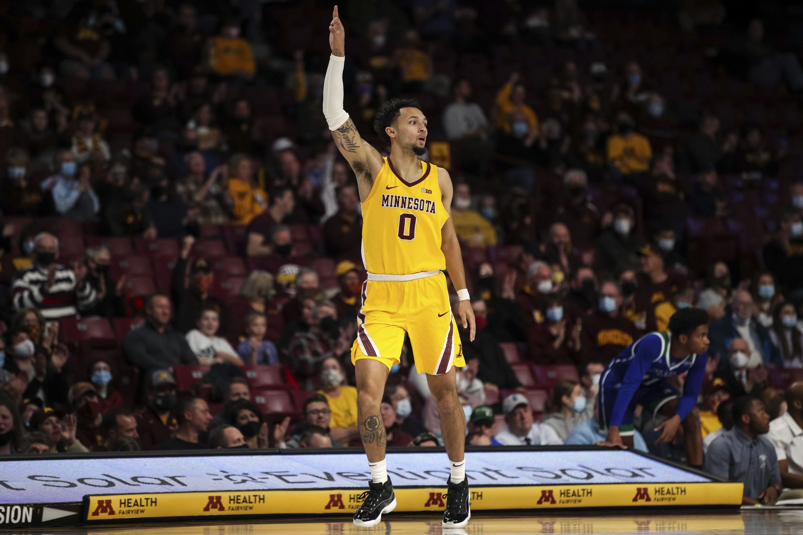 Minnesota guard Payton Willis (0) celebrates his basket during the first half of an NCAA college basketball game against Texas A&M Corpus Christi on Tuesday, Dec. 14, 2021, in Minneapolis
