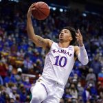 Kansas forward Jalen Wilson lays the ball up against West Virginia in the first half of an NCAA college basketball game Saturday, Jan. 15, 2022, in Lawrence, Kan.
