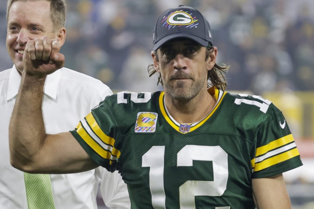 Green Bay Packers' Aaron Rodgers smiles as he leaves the field after an NFL football game against the Pittsburgh Steelers Sunday, Oct. 3, 2021, in Green Bay, Wis