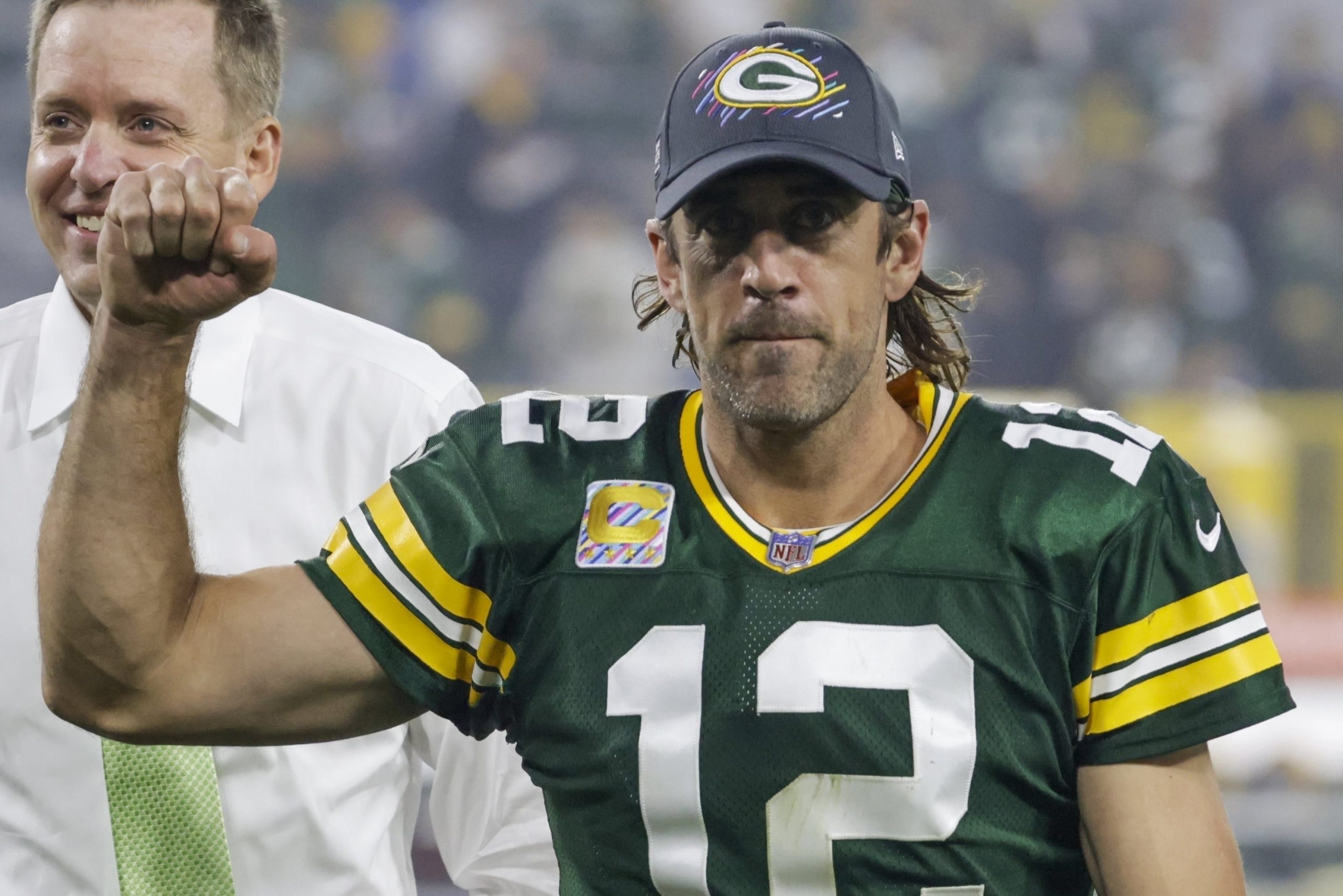 Green Bay Packers' Aaron Rodgers smiles as he leaves the field after an NFL football game against the Pittsburgh Steelers Sunday, Oct. 3, 2021, in Green Bay, Wis