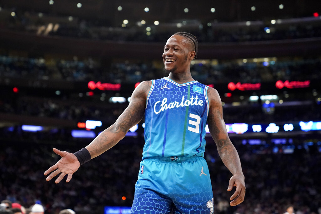 Charlotte Hornets guard Terry Rozier (3) smiles on the court during the second half of an NBA basketball game against the New York Knicks, Monday, Jan. 17, 2022, in New York.