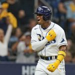 Tampa Bay Rays' Wander Franco celebrates after scoring on a single by Yandy Diaz the first inning of Game 1 of the baseball team's American League Division Series against the Boston Red Sox, on Oct. 7, 2021, in St. Petersburg, Fla.
