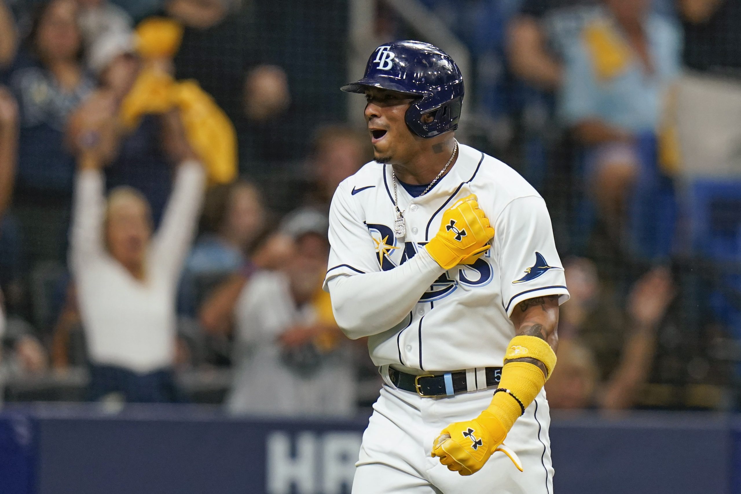 Tampa Bay Rays' Wander Franco celebrates after scoring on a single by Yandy Diaz the first inning of Game 1 of the baseball team's American League Division Series against the Boston Red Sox, on Oct. 7, 2021, in St. Petersburg, Fla.