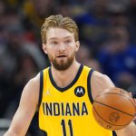Indiana Pacers' Domantas Sabonis (11) dribbles during the first half of an NBA basketball game against the Phoenix Suns, Friday, Jan. 14, 2022, in Indianapolis.