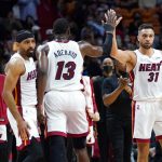 Miami Heat guard Max Strus (31) greets center Bam Adebayo (13) during the second half of an NBA basketball game against the Portland Trail Blazers, Wednesday, Jan. 19, 2022, in Miami. The Heat won 104-92.
