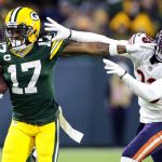 FILE - Green Bay Packers' Davante Adams tries to get past Chicago Bears' Jaylon Johnson during the second half of an NFL football game on Dec. 12, 2021, in Green Bay, Wis. Five players, including dynamic pass catchers Cooper Kupp and Davante Adams, are unanimous choices for The Associated Press 2021 NFL All-Pro Team, announced Friday, Jan. 14, 2022.