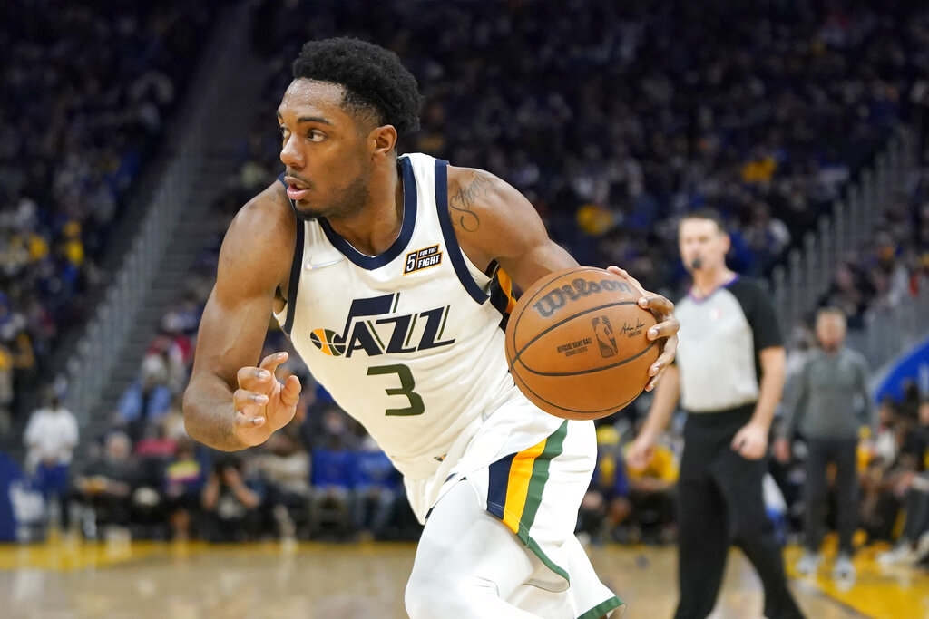Utah Jazz guard Trent Forrest (3) drives to the basket against the Golden State Warriors during the second half of an NBA basketball game in San Francisco, Sunday, Jan. 23, 2022.