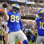 Los Angeles Rams tight end Tyler Higbee (89) celebrates with wide receiver Cooper Kupp (10) after catching a pass for a touchdown during the first half of an NFL football game against the San Francisco 49ers Sunday, Jan. 9, 2022, in Inglewood, Calif.