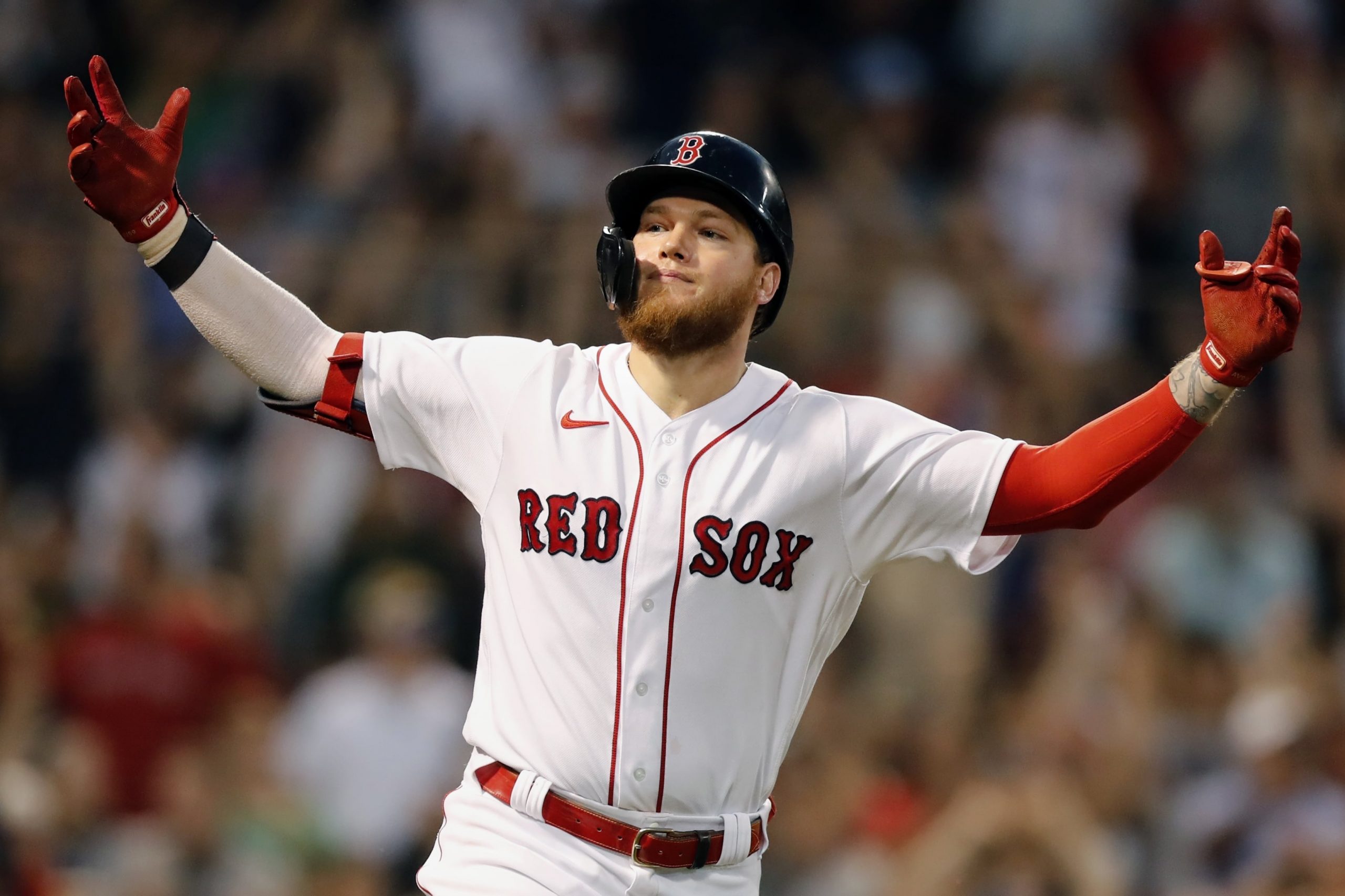 Boston Red Sox's Alex Verdugo celebrates his walk-off, RBI single during the ninth inning of a baseball game against the Cleveland Indians