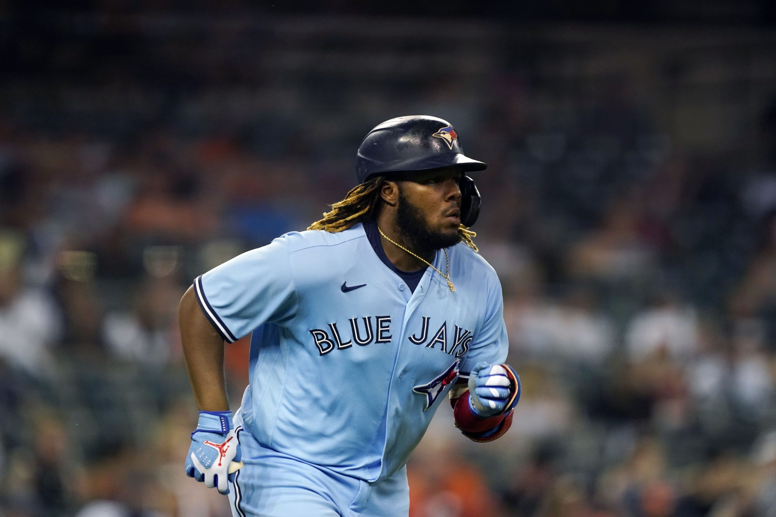 Toronto Blue Jays designated hitter Vladimir Guerrero Jr. runs to first on a single during the seventh inning of a baseball game against the Detroit Tigers, Saturday, Aug. 28, 2021, in Detroit.