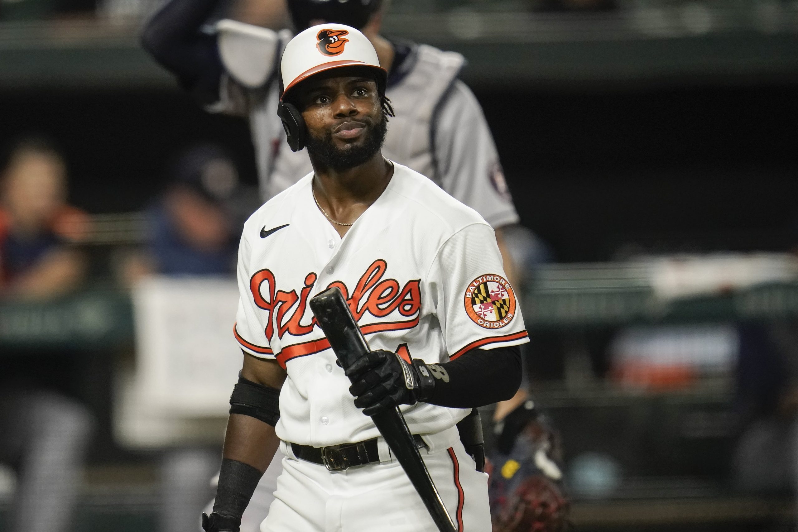 Baltimore Orioles' Cedric Mullins reacts after striking out against the Houston Astros during the fourth inning of a baseball game, Monday, June 21, 2021, in Baltimore.