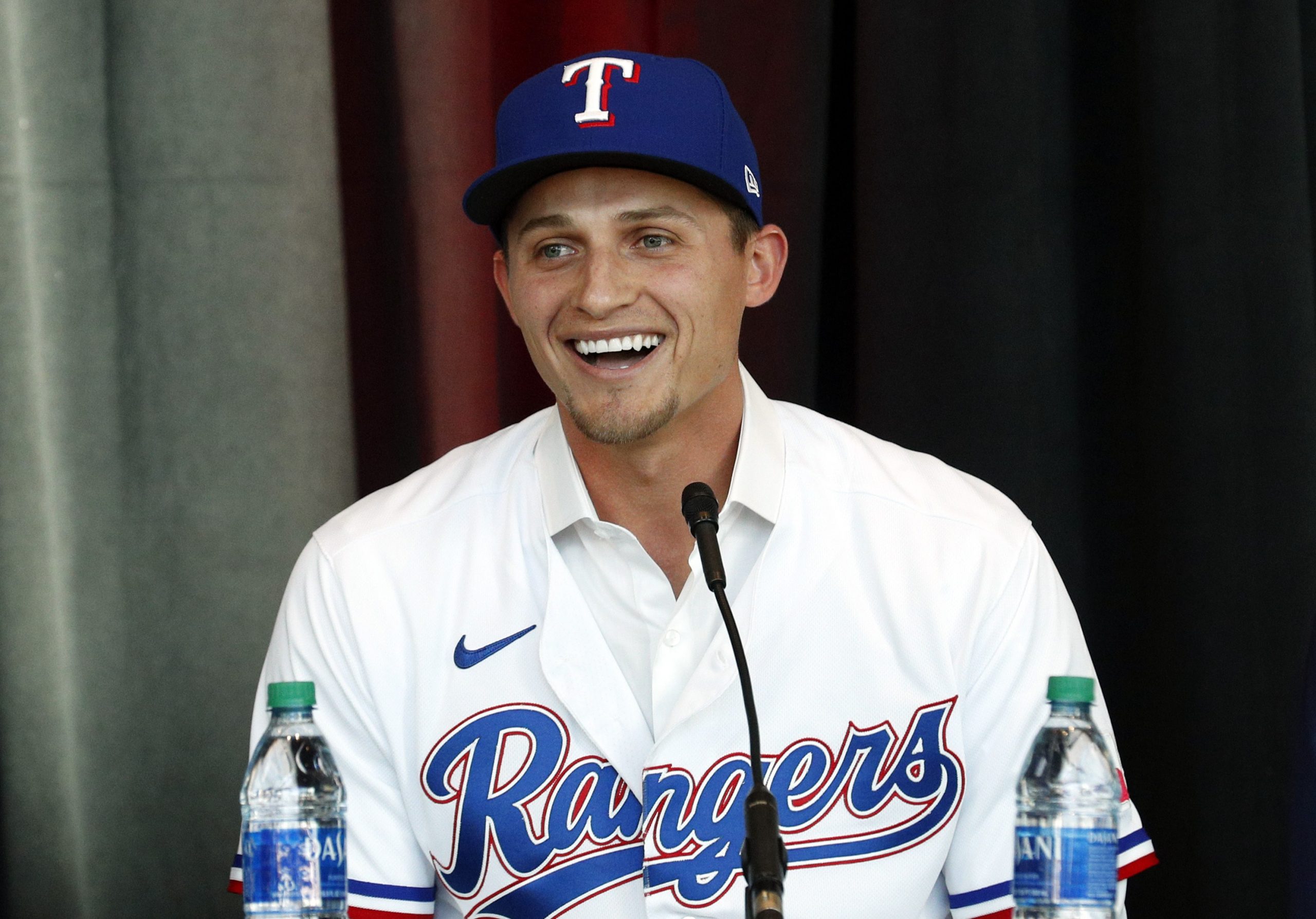 New Texas Rangers infielder Corey Seager speaks at a press conference at Globe Life Field Wednesday, Dec. 1, 2021, in Arlington, Texas. The Texas Rangers have finalized the contracts for their new half-billion dollar middle infield, wrapping up their deals Wednesday, Dec. 1, 2021 with two-time All-Star shortstop Corey Seager and Gold Glove second baseman Marcus Semien.
