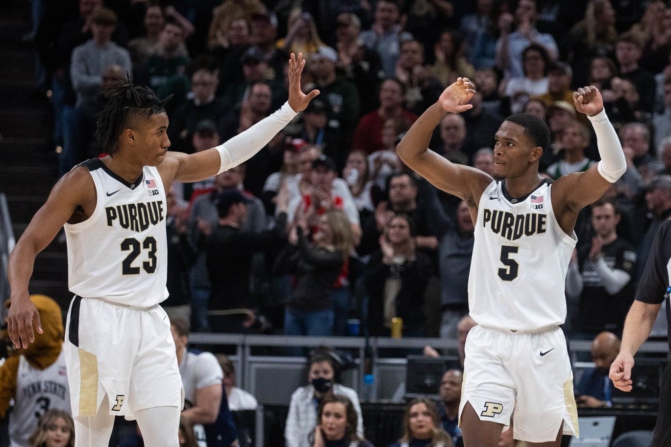 Mar 11, 2022; Indianapolis, IN, USA; Purdue Boilermakers guard Jaden Ivey (23) and guard Brandon Newman (5) celebrate the win against the Penn State Nittany Lions at Gainbridge Fieldhouse.