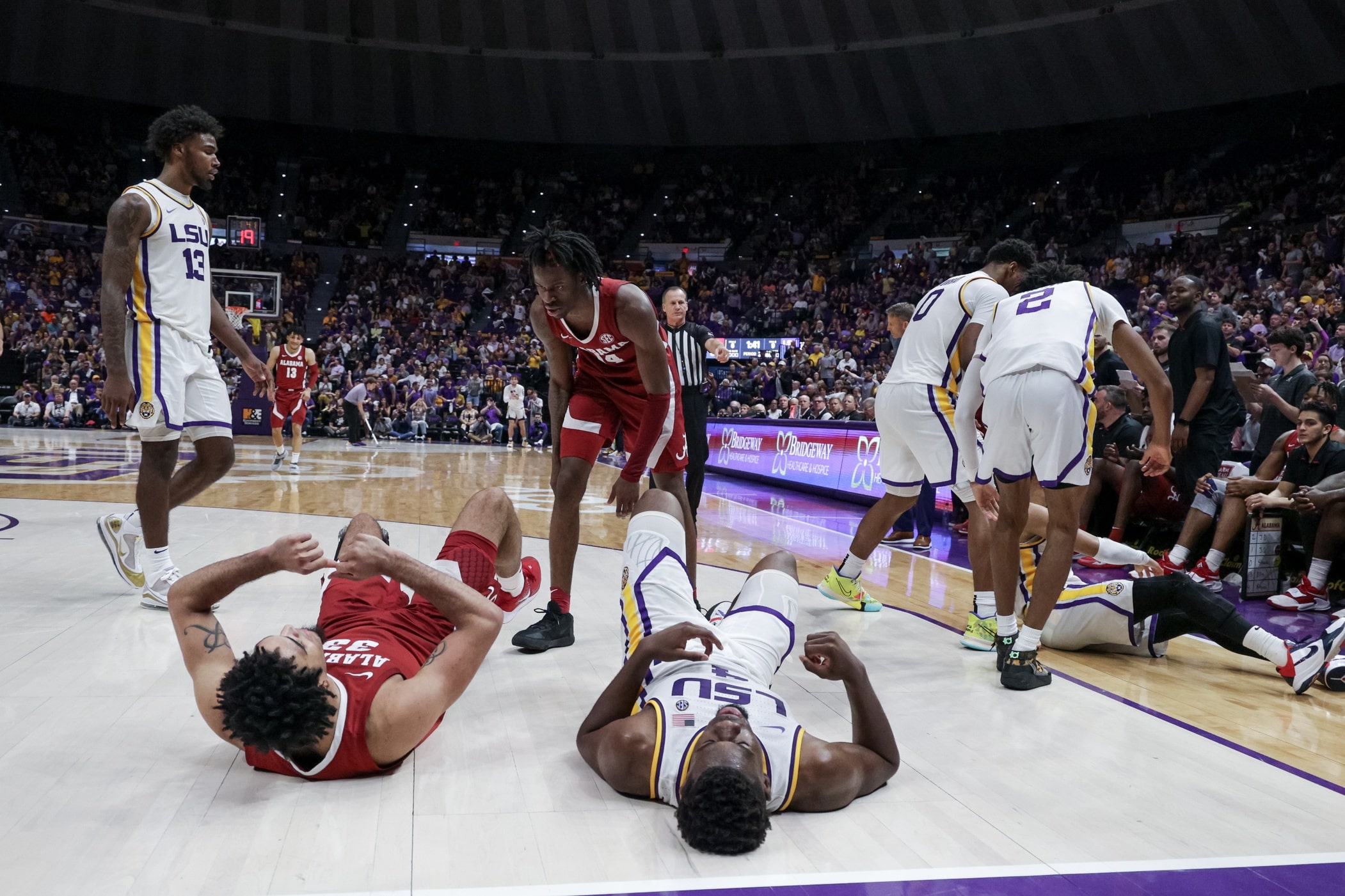 Mar 5, 2022; Baton Rouge, Louisiana, USA; Alabama Crimson Tide forward James Rojas (33) reacts to fouling LSU Tigers forward Darius Days (4) during the second half at the Pete Maravich Assembly Center.