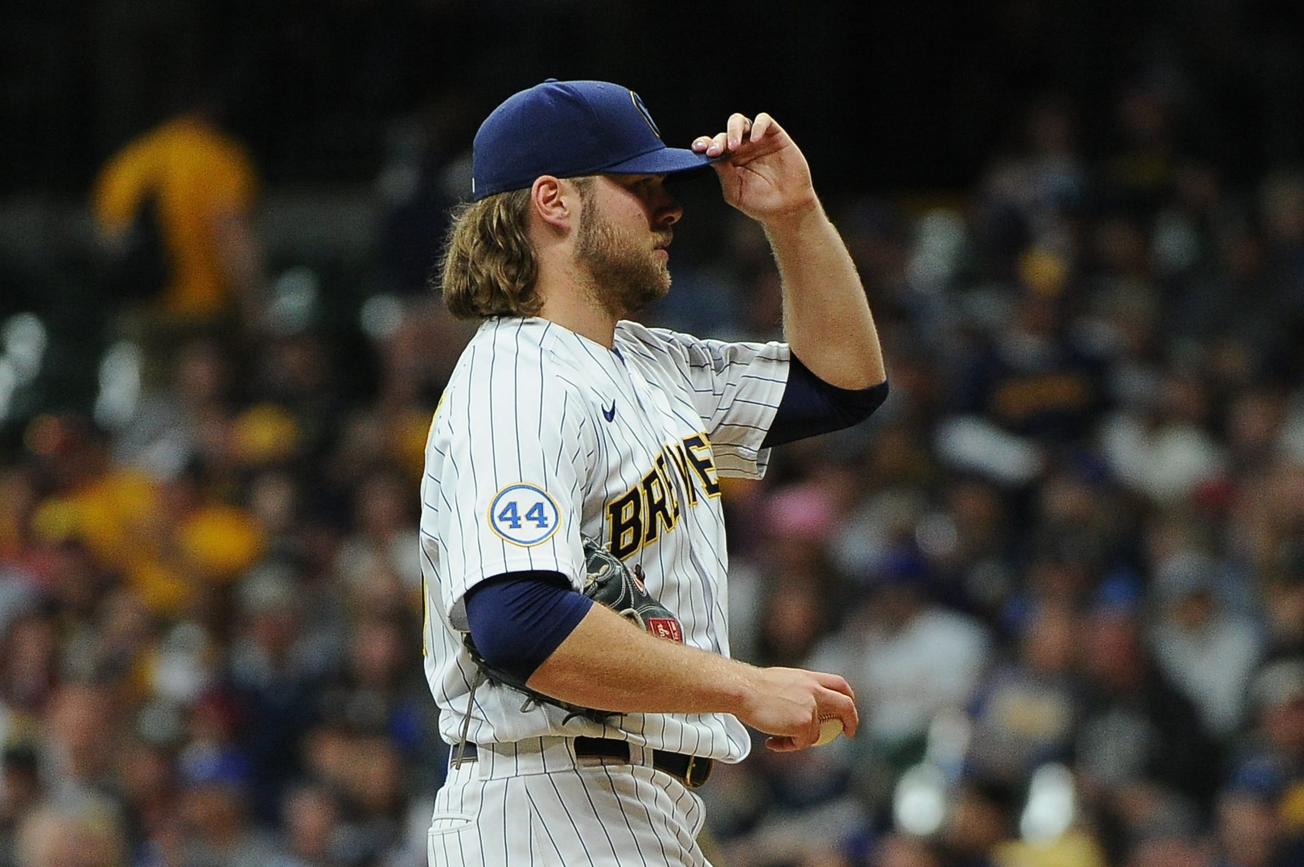 Milwaukee Brewers starting pitcher Corbin Burnes (39) takes a little extra time between pitches against the Chicago Cubs in the sixth inning at American Family Field.