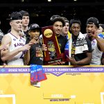 The Kansas Jayhawks celebrate after beating the North Carolina Tar Heels during the 2022 NCAA men's basketball tournament Final Four championship game at Caesars Superdome