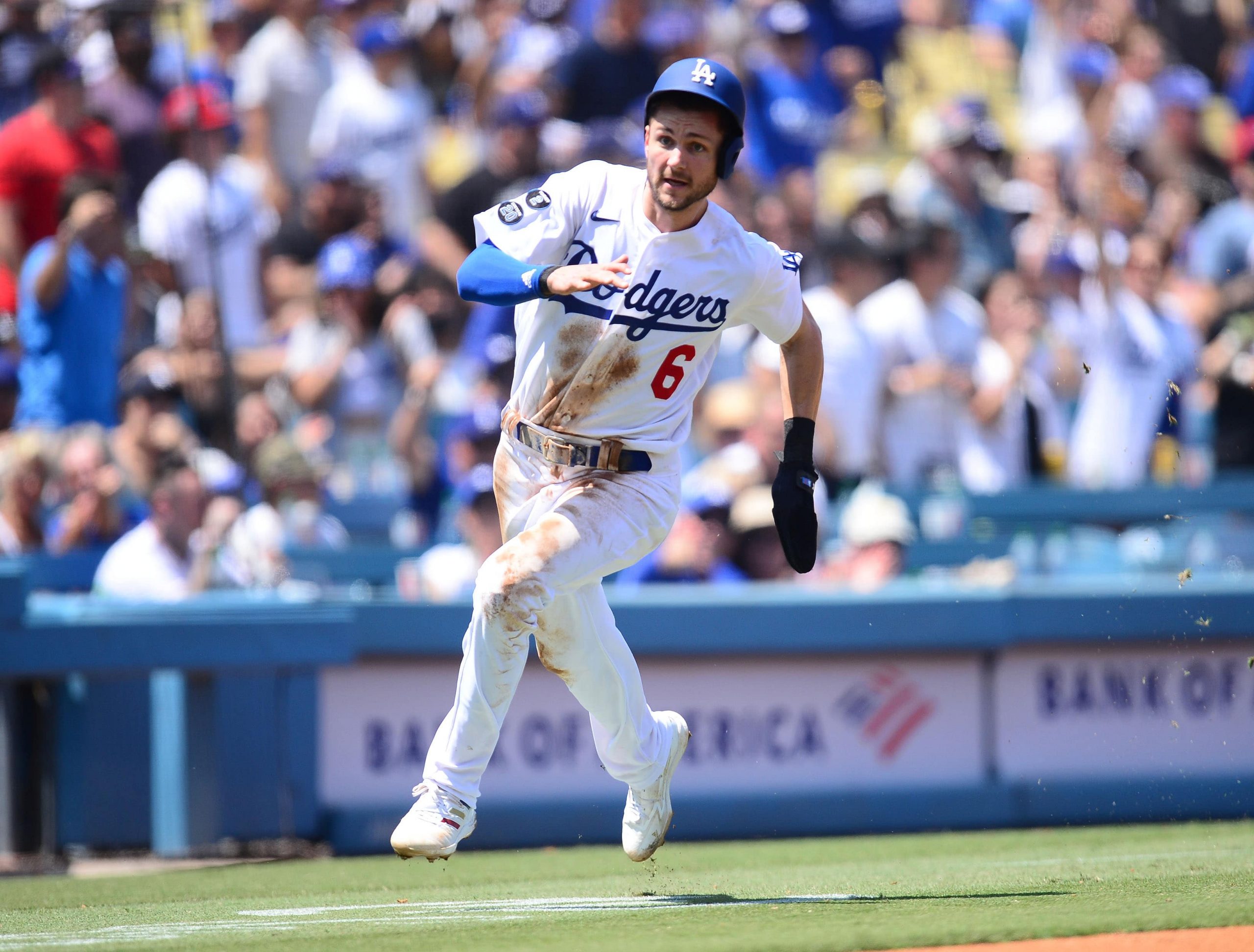 Los Angeles Dodgers second baseman Trea Turner (6) scores a run against the Los Angeles Angels during the second inning at Dodger Stadium.