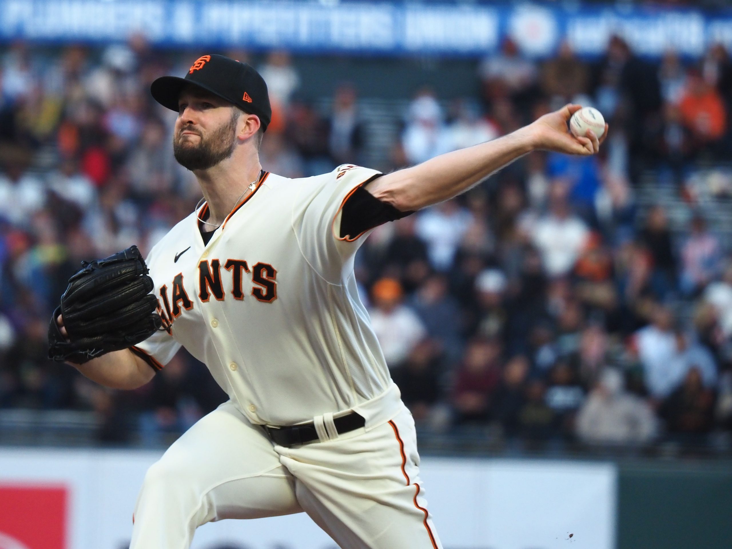 San Francisco Giants starting pitcher Alex Wood (57) pitches the ball against the San Diego Padres during the first inning at Oracle Park.