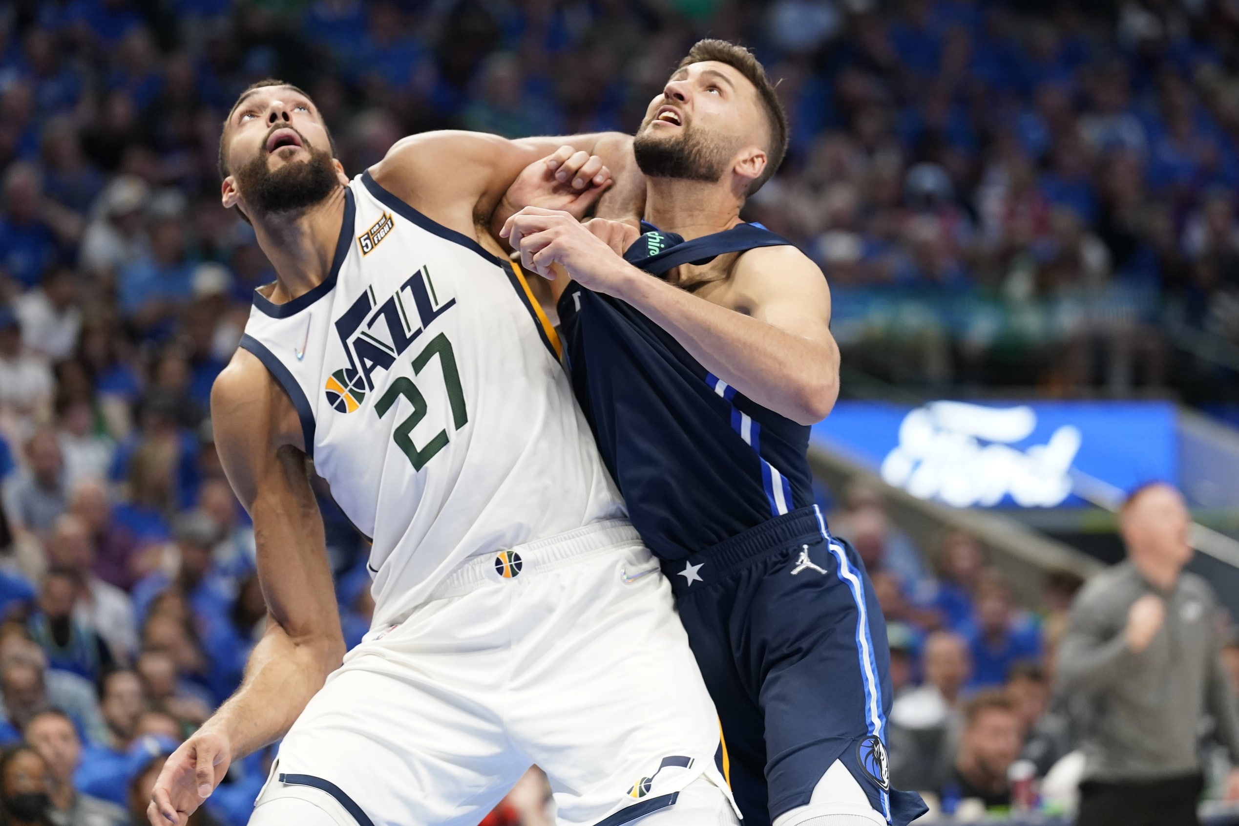 Utah Jazz center Rudy Gobert (27) and Dallas Mavericks forward Maxi Kleber (42) fight for rebound position in the second half of game one of the first round for the 2022 NBA playoffs at American Airlines Center.