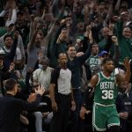 Fans cheer after Boston Celtics guard Marcus Smart (36) made a three point basket as Brooklyn Nets head coach Steve Nash (left) calls timeout during the fourth quarter of game two of the first round of the 2022 NBA playoffs at TD Garden