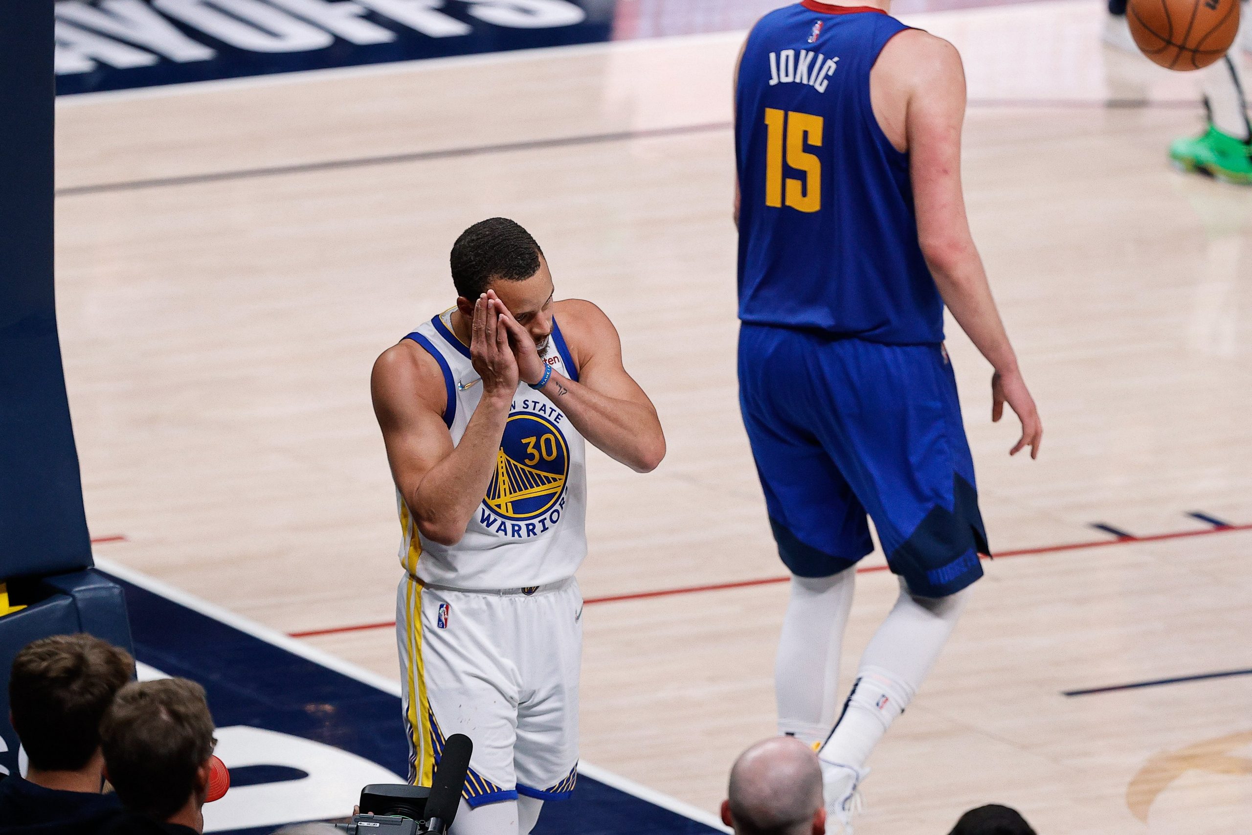 Golden State Warriors guard Stephen Curry (30) reacts after a play in the fourth quarter against the Denver Nuggets during game three of the first round for the 2022 NBA playoffs at Ball Arena