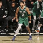Boston Celtics forward Jayson Tatum (0) reacts after making a three point shot in the fourth quarter against the Brooklyn Nets at Barclays Center.